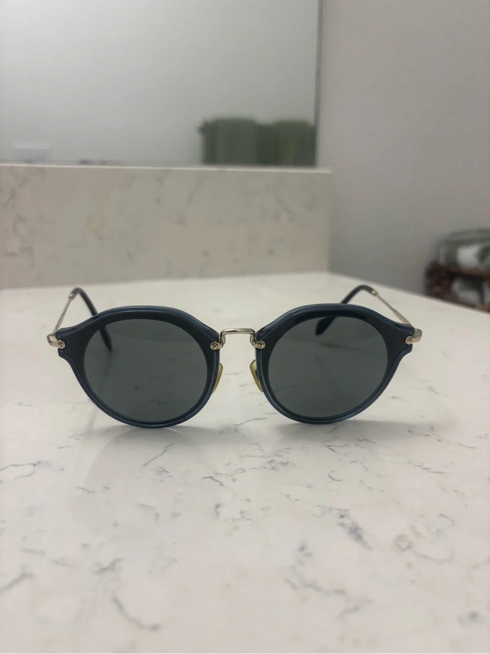 Miu Miu Black Round Sunglasses with Gold Bridge